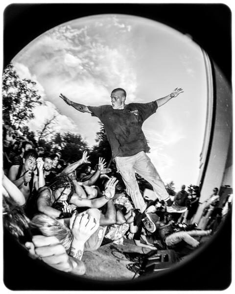 Stage Diver at a Turnstile Show at the Clifton Park Bandshell