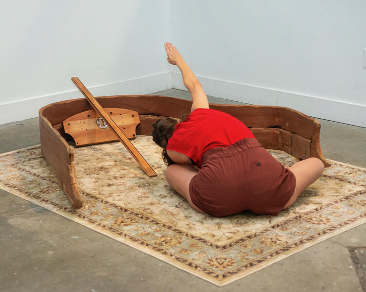 Still from performance of Garment/Gauge