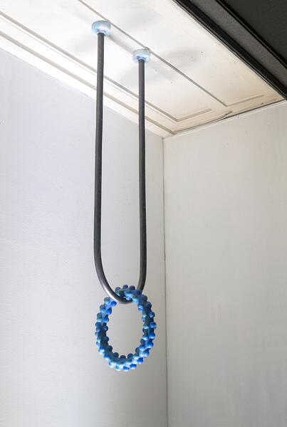 Speculative Score #4: hanging ring 2023 PVC pipe, silicon, pigment, 36” x 9” x 12”