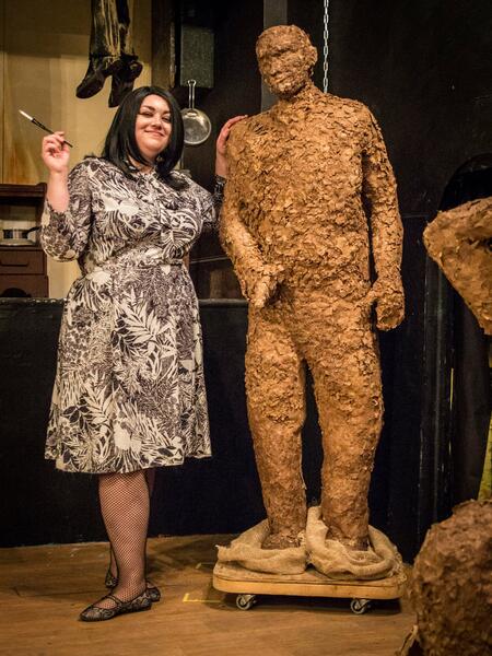 A Clay Statue of a Cop from A Bucket of Blood (A Yellow Sign Theatre Production)