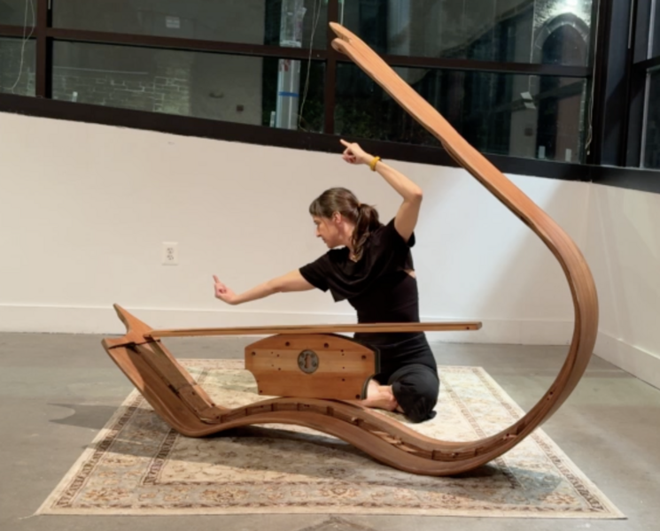 Still from performance of Garment/Gauge