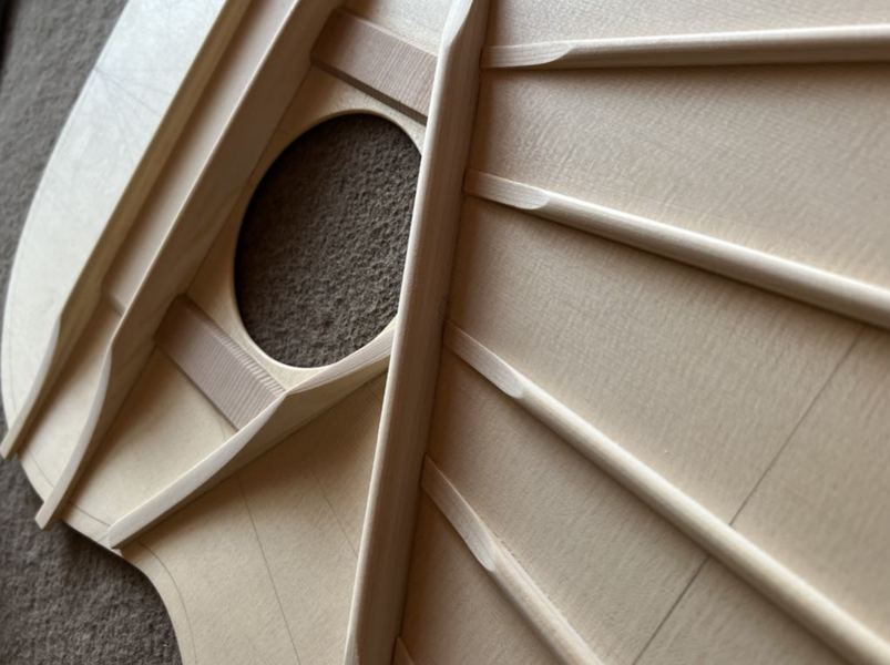 Soundboard and Asymmetric Harmonic Architecture