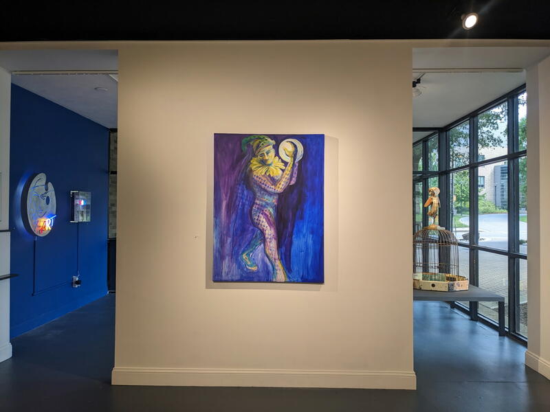 Exit area with acrylic Blue Mardi Gras by Diana Marta; neon by Lili Lakich to the left; Octogenarian assemblage by Mary Opasik to the right