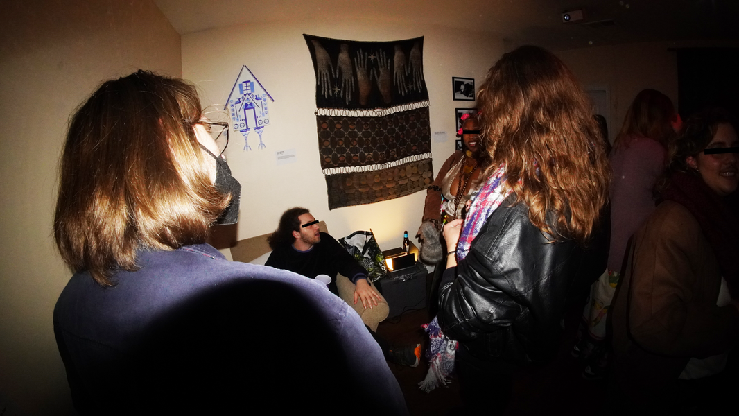 Attendees in the Dark Room