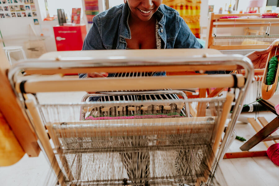 Soft Gather, Quiet Flame participant weaving