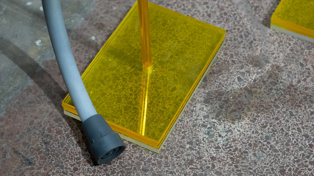 Gray rbbr Cane, 2022. Silicone rubber, wire, lucite  40” x 15” x 20”