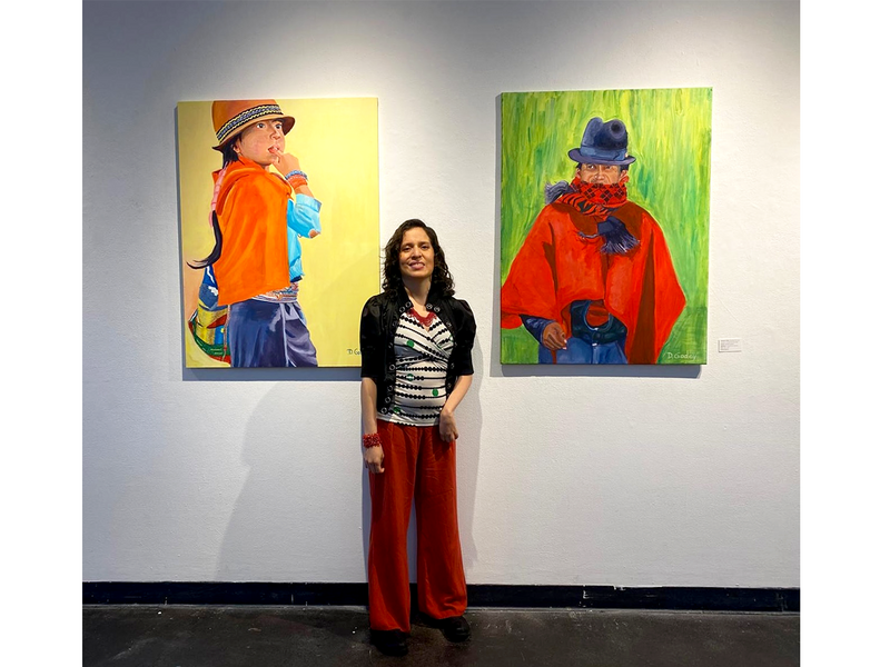  Artist with her paintings Unidos Por el arte group show at Creative Alliance 