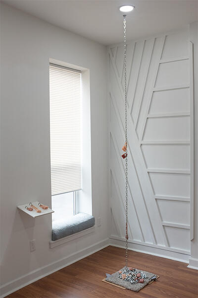 Chainlinked, 2025. Silicone, metal chain, carpet, spray paint, clipboards  16” x 16” x 168”