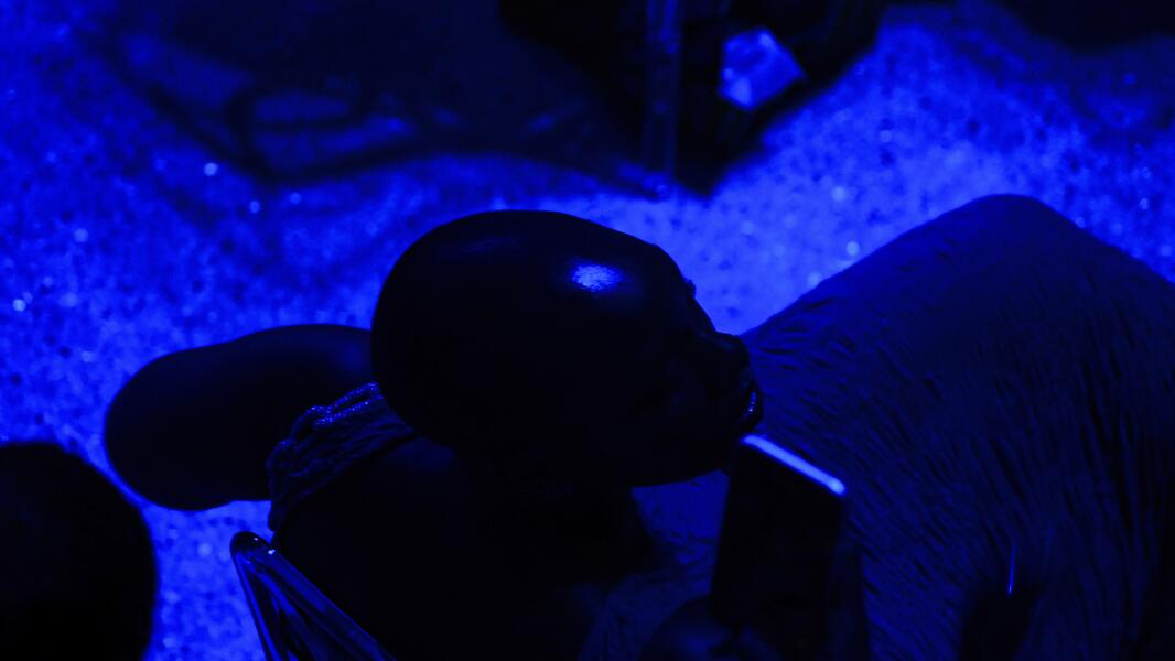 Woman in Blue Light