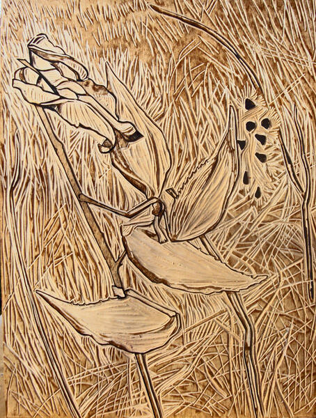 Carved woodblock for milkweed pods.