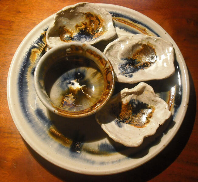 Oyster plate with dish for cocktail sauce