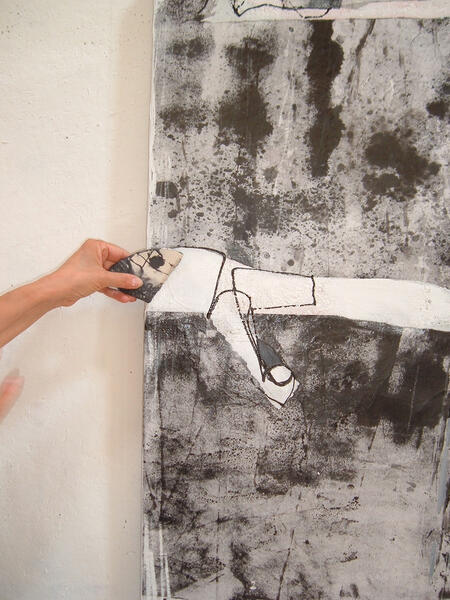Applying clay shard to sumi-e ink painting