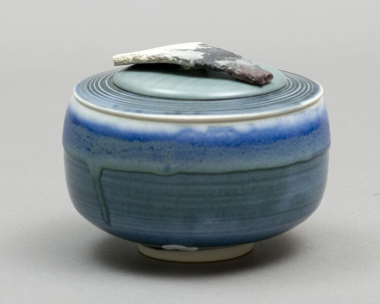 Container with clay/wood lid