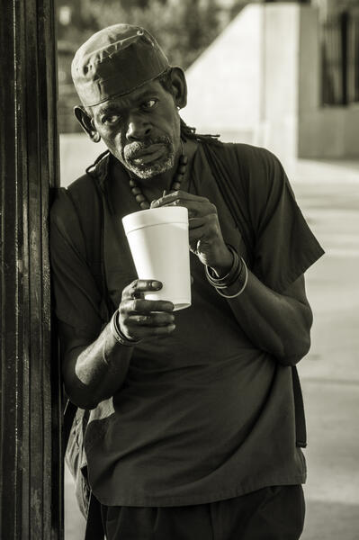 Candid: Man Waiting for the Bus