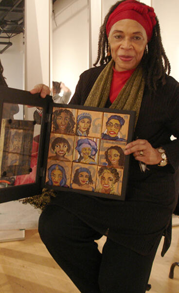 Sharon King with her self portrait box to be hung on the wall