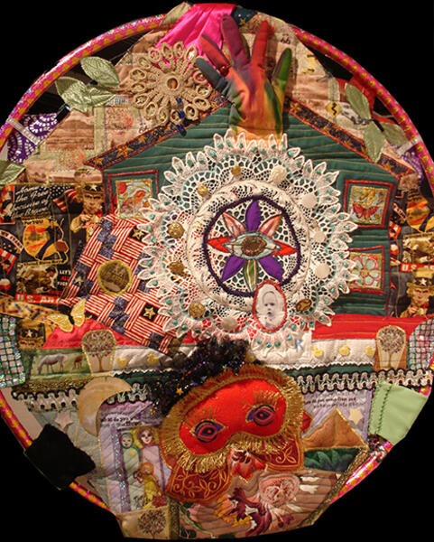 Front side of "hula hoop quilt" self-portrait. Fabric and collected memorabilia, quilted and supported on hula hoop.  Nov 2013