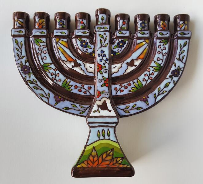 Menorah with painted flowers,  birds, sun, clouds,  and landscapes