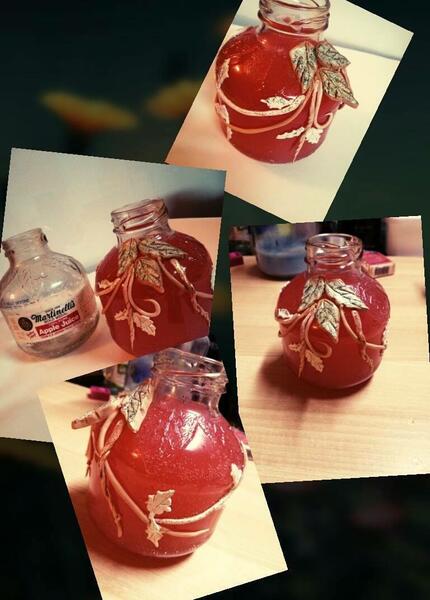 Clay on glass bottle