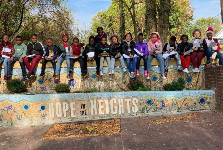 Park Heights Renaissance 2019 in Shirley Avenue Park. Collaboration between Park Heights Renaissance, Safe Streets, and Youthworks. 31 high school students worked with artist Herb Massie to help design this anti violence mural for the park. There is an e 