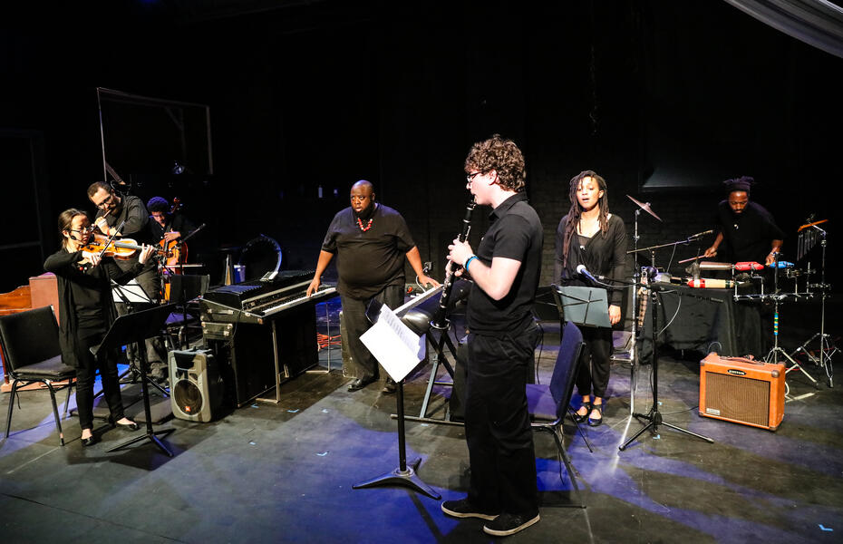 Color image of the ensemble performing.