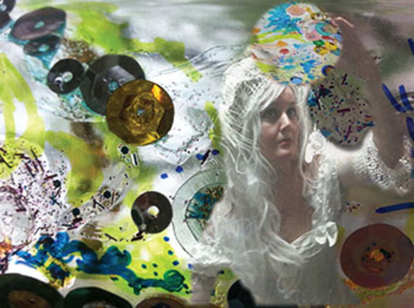 The ground is toxic, the sky has gone dark. Bodies of water have been salvaged into gaudy plastic trash.