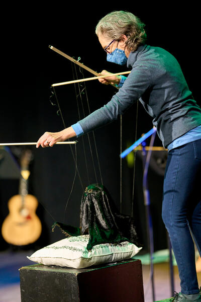 Puppeteer Ursula Marcum manipulates "Minor Depression" puppet during Winter Seeds performance.