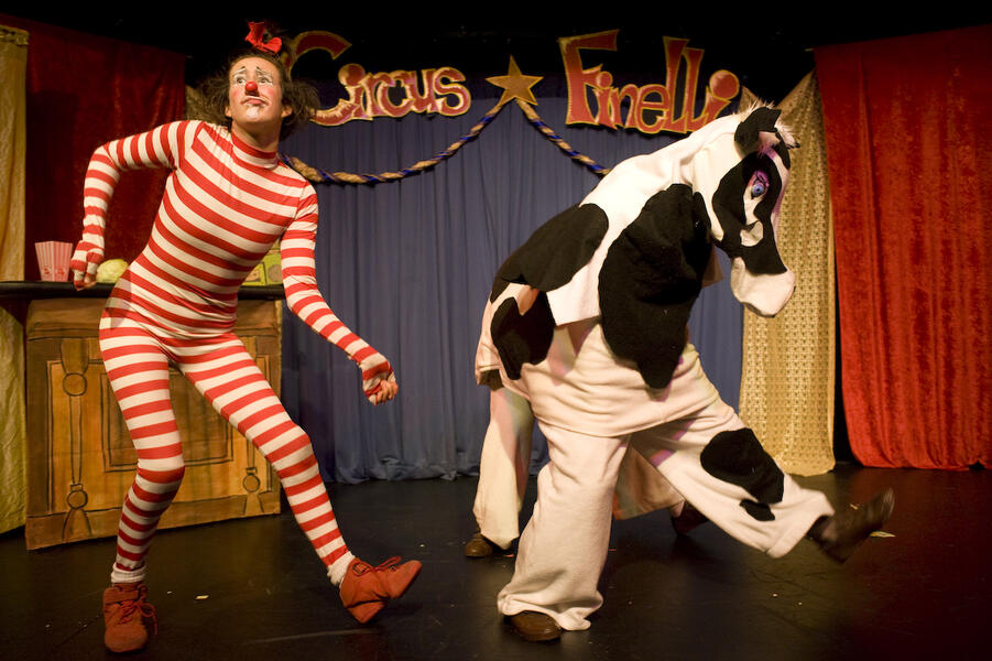 clown and cow dancing