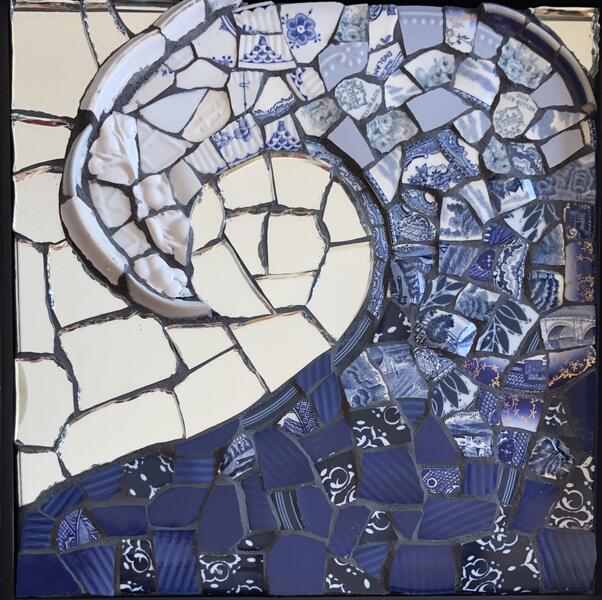 mosaic wave created with broken dishes and mirror