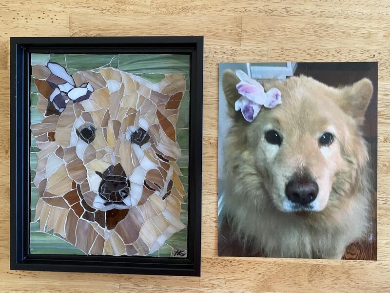 Stained glass mosaic portrait of a dog