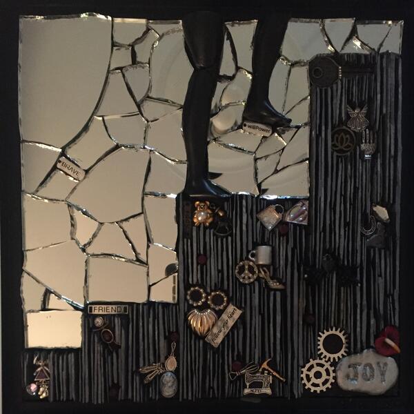 Mosaic created with slate, mirror and found objects depicting the challenges unique to a woman's life