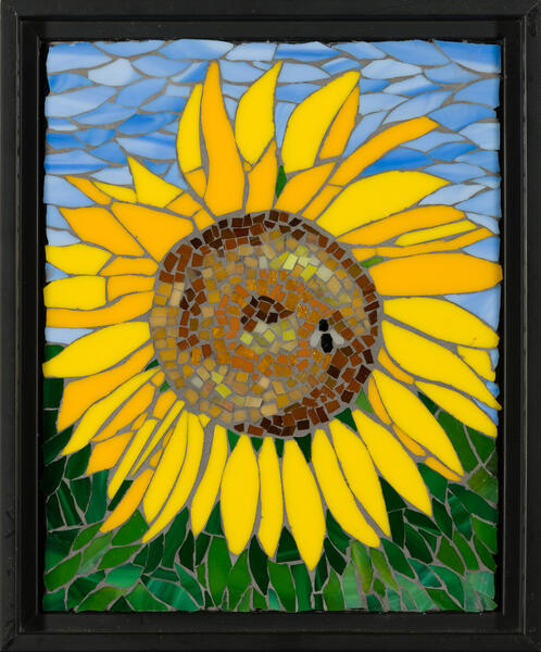 Hand cut stained glass on glass mosaic of a sunflower