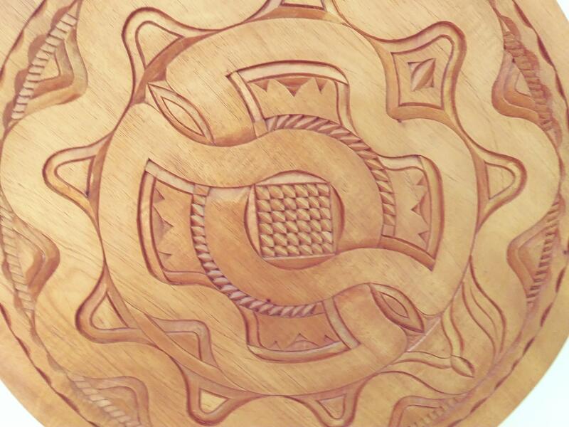 AFranszoonHeadlessSnakeCarvingCloseup19 inchesdiameter.jpg