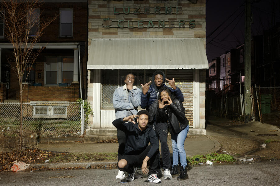 A group poses for a portrait in Broadway East.