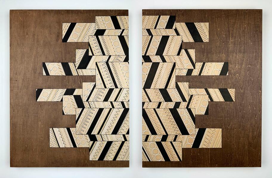 Geometric mirrored panel design on wood surface