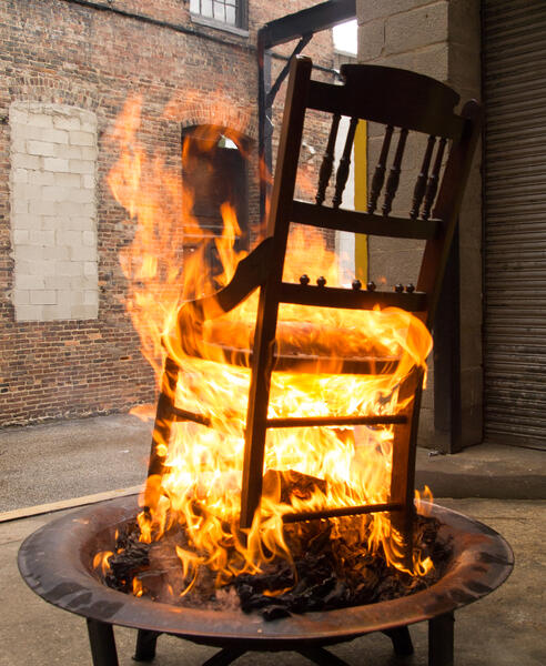 burning the chair to make the paint ( for Turn it over)
