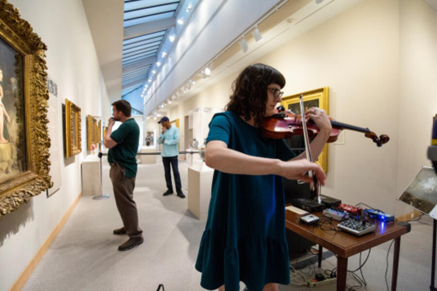 Violist and composer Liz Meredith performs an original work meditating on the landscape paintings on the 4th floor in 2018. The Walters Museum Members Magazine (Summer, 2019).