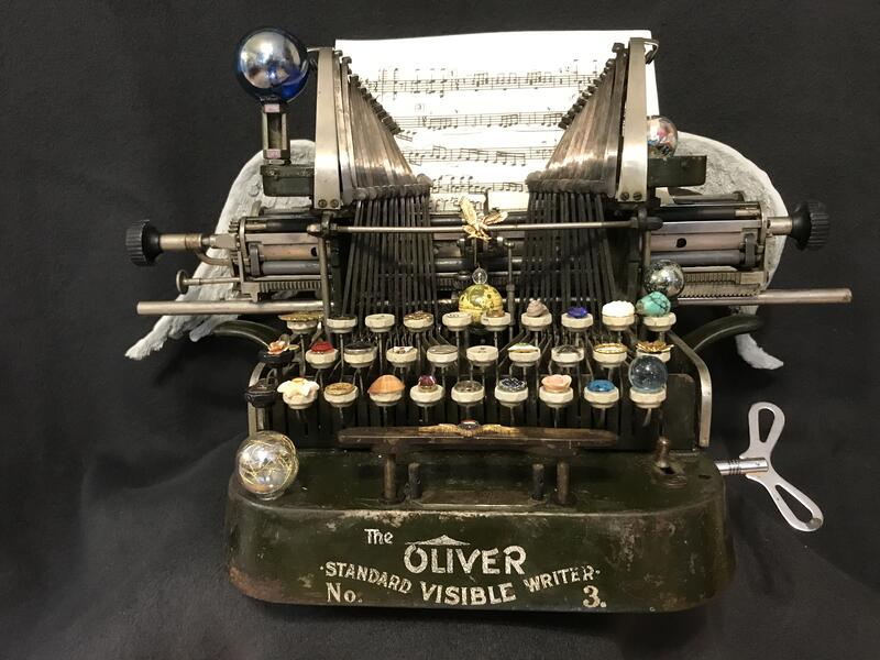Typewriter assemblage  music  wings
