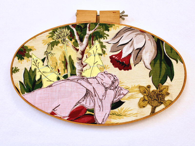 Dream, freehand machine stitched figure, on  vintage barkcloth