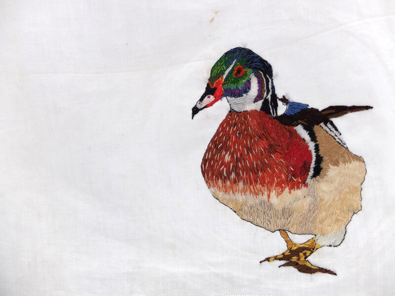fiber art, hand embroidery, art installation. climate change, birds 