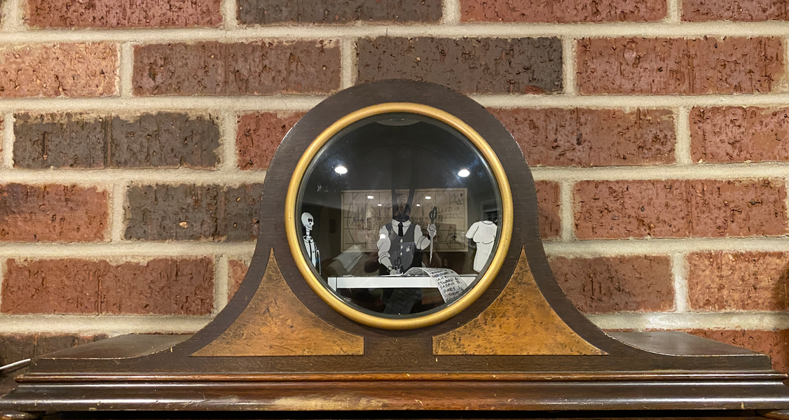 Diorama in a mantle clock case