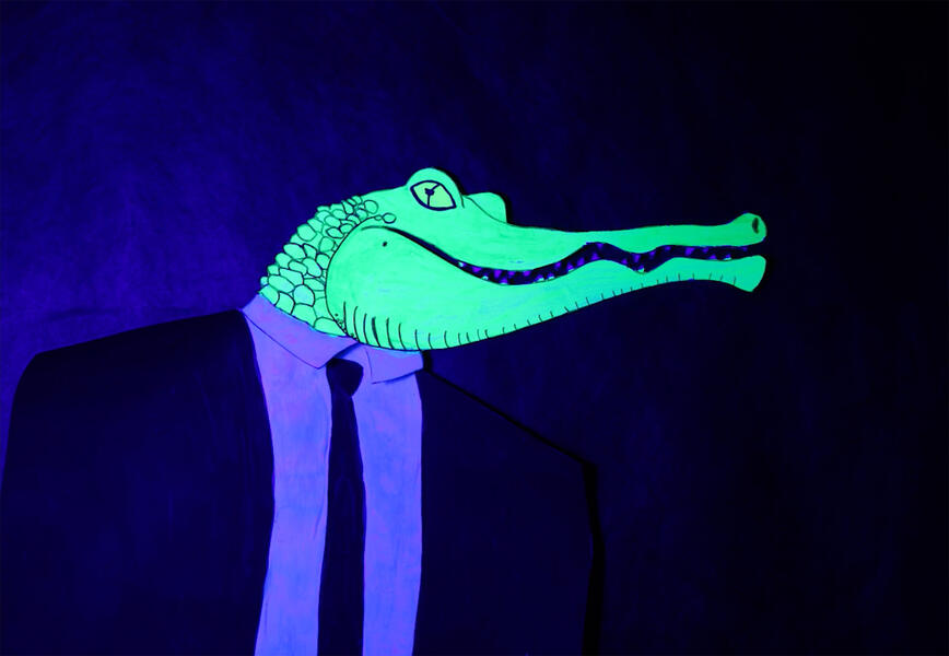 Drawing of a crocodile under a black light