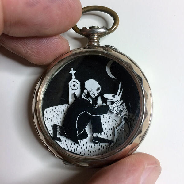 Diorama in a pocket watch, a skeleton and his skeleton dog being reunited