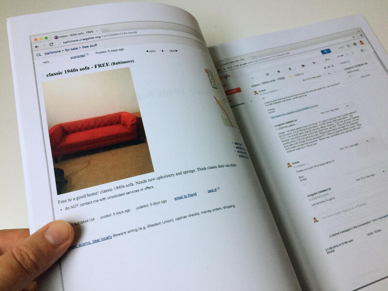 Close up of an open book with thumb on left-hand page showing a screenshot from Craigslist