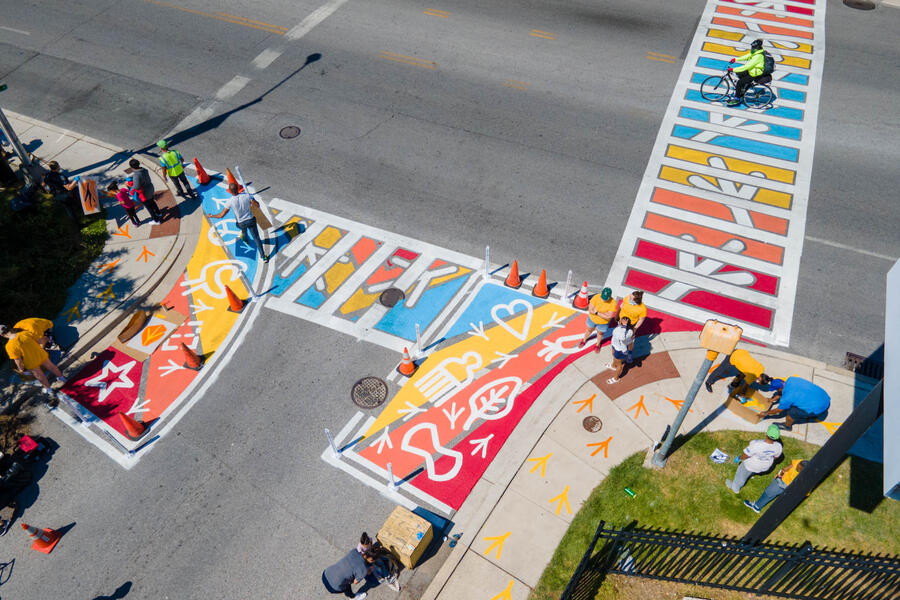York Rd Unity Tracks art crosswalks community paint day birds-eye view